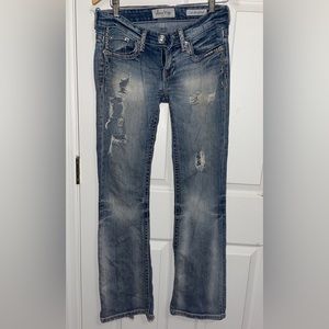 Low-rise Distressed Bootcut Jeans